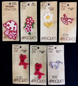 Set 7 Wrights Applikation zum Aufnähen Pilz Blume Einhorn Hund Schaukelpferd Vintage - Bild 1 von 2