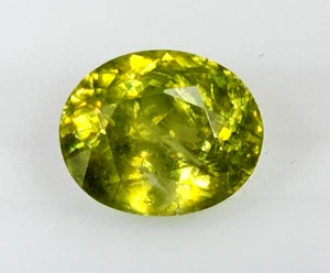 SPHENE TITANITE NATURAL 1.99 Cts GOOD QUALITY LOVELY GREEN COLOR AND LUSTER OVAL - Picture 1 of 3