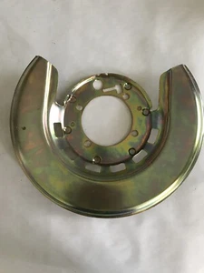 1976-1982 Corvette RIGHT FRONT Trailing Arm Backing Plate GOLD NEW - Picture 1 of 3