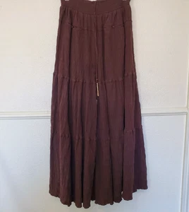 Free People Taglia M In Paradise Pantaloni a Gamba Larga in Cuolottes Marrone Cioccolato Fumè - Foto 1 di 21