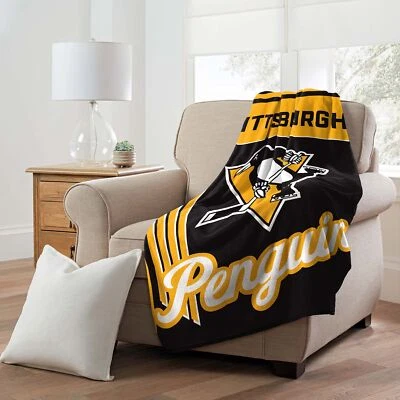 Manta de microfibra 46" x 60" con licencia oficial de la NHL Pittsburgh Penguins Foto 1 de 4