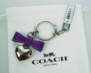 Coach Schlüsselanhänger Herz und Schleife - Bild 1 von 1