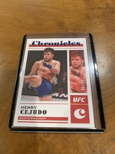 Henry Cejudo Red 2023 Panini Chronicles UFC Card #1.  Card Of 96/99