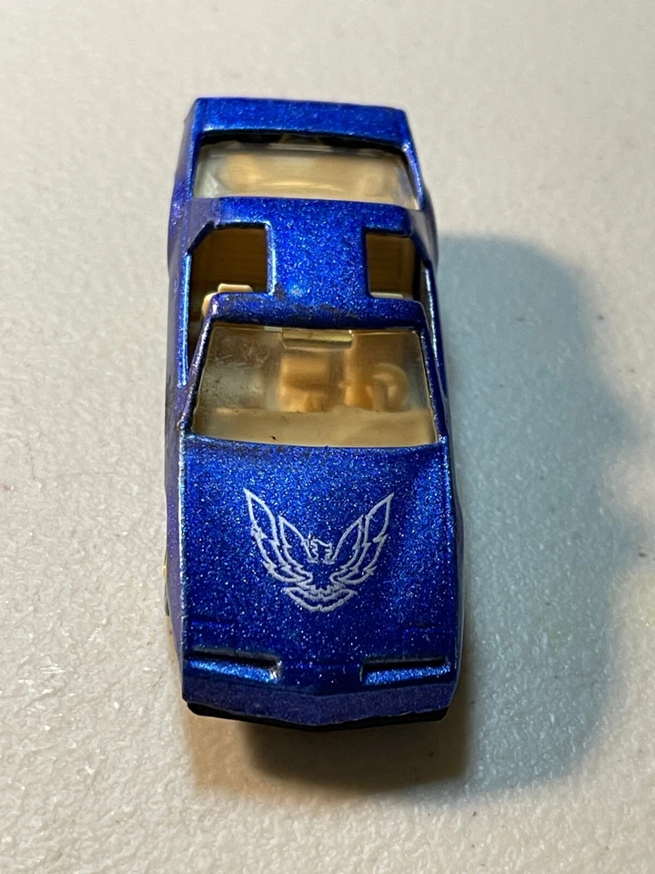 De colección Hot Wheels Años 80 Firebird Azul Brillante Escama Oro Ruedas Hot Ones Malasia Foto 1 de 4