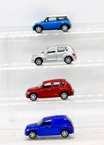 1/39 ROAD CHAMPS LOT (2) PT CRUISERS, A PANEL CRUISER AND A MINI COOPER (4 Cars) - Picture 1 of 9