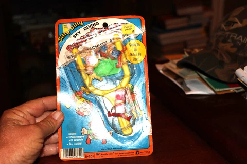 Vintage 1975 Imperial Poopatrooper Rubber Parachute Toy Silly Dilly Skydiver Cover