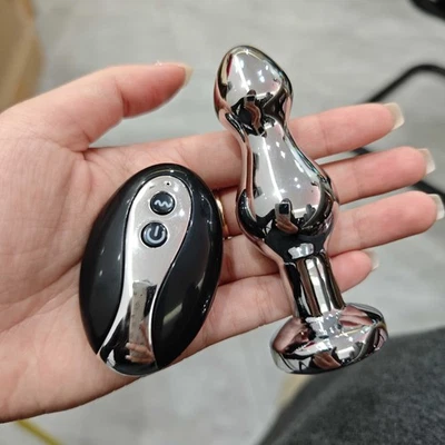 Masajeador de punto G vibrador anal pero plug de metal masajeador juguetes sexuales para hombres mujeres Foto 1 de 4
