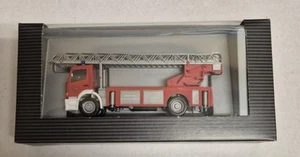Herpa MB Atego DLK 23/12 Feuerwehr neutral rot IAA 2000 - Picture 1 of 1