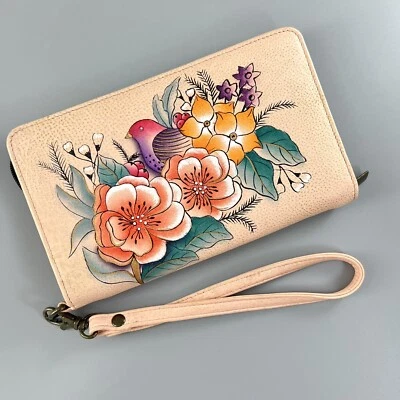Cartera sin asas Anuschka pintada a mano de cuero rosa, pulsera con cremallera floral y pájaro Foto 1 de 4