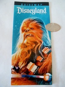Disneyland Park 2016 Chewbacca FÜHRERKARTE & GEPRESSTES VIERTEL SET DISNEY NEU 60. - Bild 1 von 1