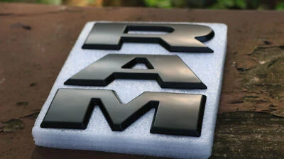Front Grille Emblem Letters For 2019-2023 RAM 1500 Grill Badge Black 68311411AA - Image 1 of 4