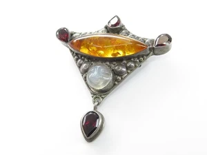 Broche colgante vintage de plata esterlina Sajen cara de luna con gemas ámbar y rojo - Imagen 1 de 6