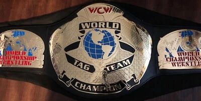 WCW Tag Team Championship réplica firmada Sting, Luger, Nash, Hall, Nasty Boys Foto 1 de 4