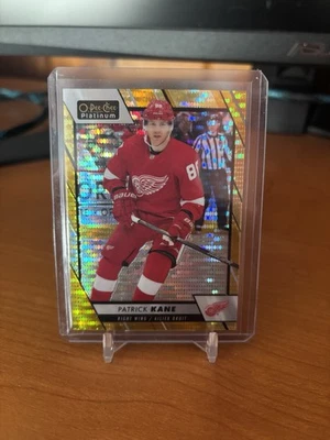 2023-24 O-Pee-Chee Platinum - Patrick Kane #147 oro sísmico/50 alas rojas Foto 1 de 2