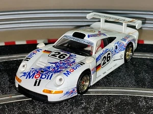 1279- Scalextric FLY Porsche 911 GT1 EVO 4º Sebring 97 #26 Mobil Ref. A51 1:32 - Imagen 1 de 3