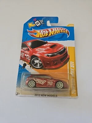 2012 Hot Wheels #33 Subaru WRX STI Metalflake Red 33/50 New Models Redline 5SP - Image 1 of 2