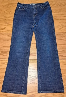 Pantalones de mezclilla elásticos azules medianos Levis 512 perfectamente adelgazantes Bootcut para mujer 12  Foto 1 de 4