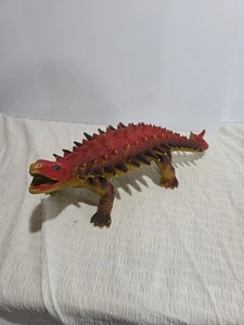 Modellino giocattolo dinosauro ANKYLOSAURUS UKRD vintage rosso giallo 13" - Foto 1 di 7