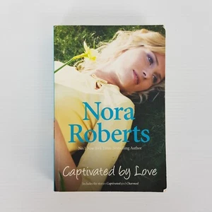 Captivated by Love by Nora Roberts (PB 2010) Captivated & Charmed (2 in 1) - Bild 1 von 10