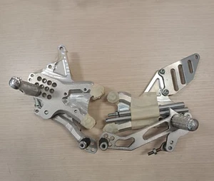 PEDANE ARRETRATE REGOLABILI FLYHAMMER PER APRILIA RSV4 TUONO V4 2017-2024 CNC - Foto 1 di 3