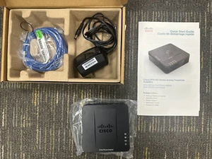Cisco SPA100 Analog 2 Port Phone Adapter with Adapter Cables and Guide - Picture 1 of 3