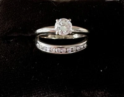 14 KT White Gold, Ladies Wedding Ring With Channel Set Band and appraisal  - Image 1 of 4