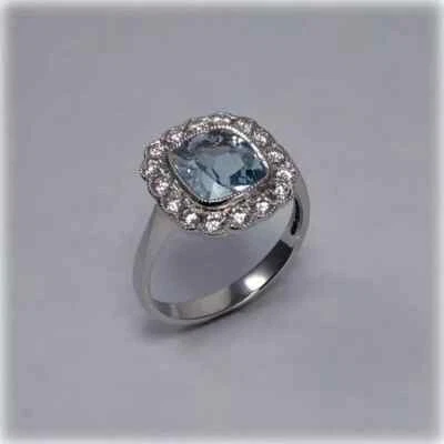 Anillo de compromiso de diamantes y aguamarina natural de 1,50 quilates de oro blanco sólido de 14 quilates Foto 1 de 4