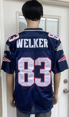 Camiseta de fútbol americano oficial de la NFL REEBOK WES WELKER nueva Inglaterra PATRIOTA #83 logotipo cosido Foto 1 de 4