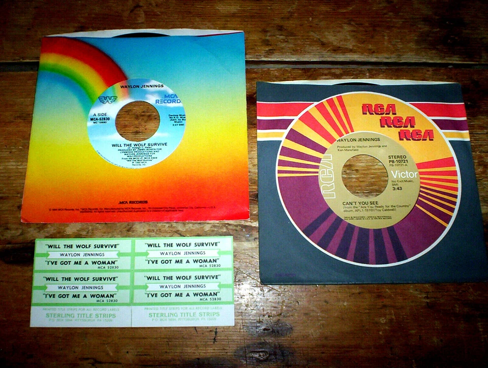 WAYLON JENNINGS ( 2 ) 45 lot: WILL THE WOLF SURVIVE w. strips / CAN'T YOU SEE NM - Image 1 of 1
