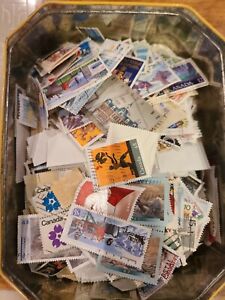 Canada  lot of 200 different used stamps on and off paper