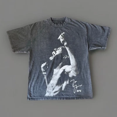 Camiseta UFC Jon Jones Signature Gráfica Talla L Gris Carbón Foto 1 de 4