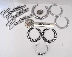 LOT OF 11 CADILLAC EMBLEMS & DECALS New & Used- See full Description - Picture 1 of 8