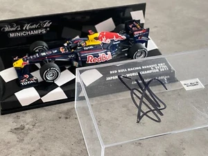 Red Bull RB7 S. Vettel World Champion 2011 Japan GP + Autogramm Minichamps 1/43 - Bild 1 von 4