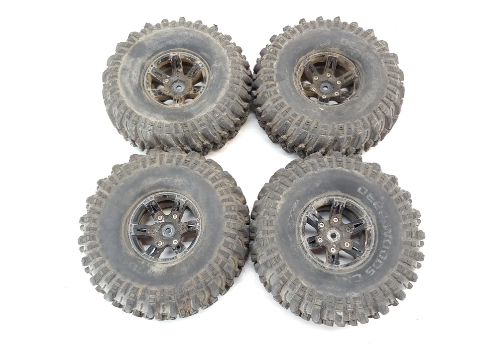 4x Duratrax Deep Woods 1.9" Crawler Tires on 12mm Hex BEADLOCK METAL WHEELS - Image 1 of 4