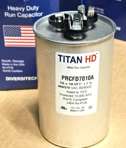 Condensador de doble funcionamiento con motor TITAN HD: redondo, 440/370V CA, 70/10 mfd, 4 13/32 - Imagen 1 de 5