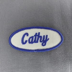 Toppa distintivo Cathy 4,5"" x 1,5"" blu ovale bianco cucito - Foto 1 di 2