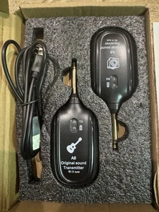 Sistema de Guitarra Inalámbrico A8 - Audio 2.4GHz 24 Bit 48KHz, 100 ft Negro (1TX+1RX) PROBADO - Imagen 1 de 2