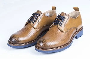 SCARPA ELEVEN ARTIGIANALI IN PELLE CUOIO CON LAVORAZIONE INTRECCIATA SUOLA BLU - Foto 1 di 6
