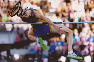ATHLETICS: MIHAI DONISAN SIGNED 6x4 ACTION PHOTO+COA *HIGH JUMP* *ROMANIA* - Picture 1 of 1