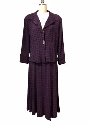 Conjunto de falda midi asimétrica y chaqueta texturizada talla M IC By Connie K de colección Foto 1 de 4