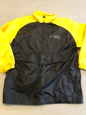 Chaqueta Nike Juvenil Mediana (10-12) Anorak Pullover Negro/Amarillo Cortavientos Informal Foto 1 de 4