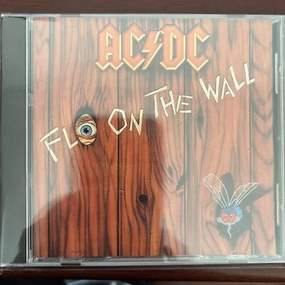 AC/DC - Fly On The Wall (CD 465257 2) 1985 prensa australiana Foto 1 de 2