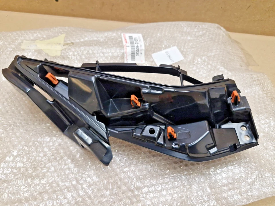 Soporte de faro delantero izquierdo Toyota Land Cruiser 2017-en 5324660030 genuino NUEVO Foto 1 de 4