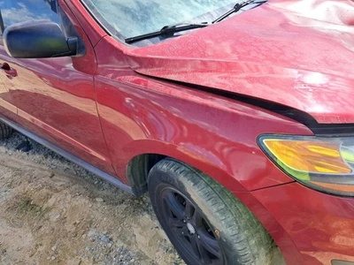 Hyundai Santa Fe 2010 guardabarros de pasajero derecho rojo usado camioneta local solamente Foto 1 de 3