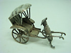 Miniature metal old rickshaw