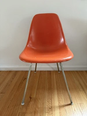 Vintage Herman Miller Eames Fiberglass Chair In Orange With Wall Saver Base - Image 1 of 4