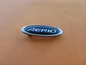 02 03 04 05 06 07 SUZUKI AERIO RIGHT FENDER EMBLEM LOGO BADGE SYMBOL SIGN A44206 - Picture 1 of 4
