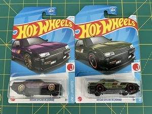 SET BESTEHEND AUS 2 - 2024 HOT WHEELS NISSAN SKYLINE RS (KDR30) J-IMPORTS FARBVARIANTEN - Bild 1 von 3