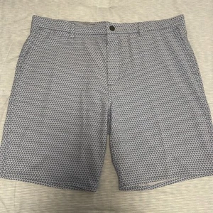 Pantaloncini Johnnie-O Prep-Formance blu stampa floreale taglia 38 elasticizzati performance golf - Foto 1 di 7