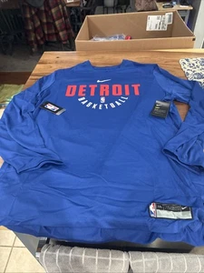 Camisa MANGA LARGA PARA HOMBRES NIKE DETROIT PISTONS emitida por el equipo AZUL XXL 2XL NUEVA CON ETIQUETAS - Imagen 1 de 9